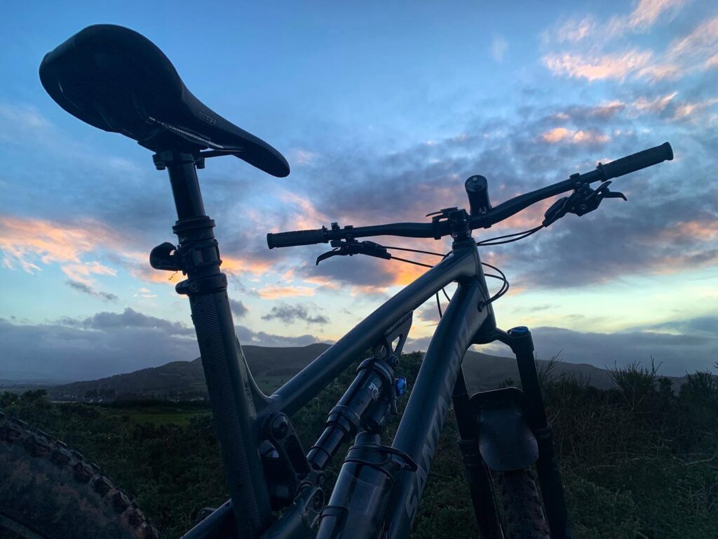 Post sunset gloaming with hills and mountain bike.