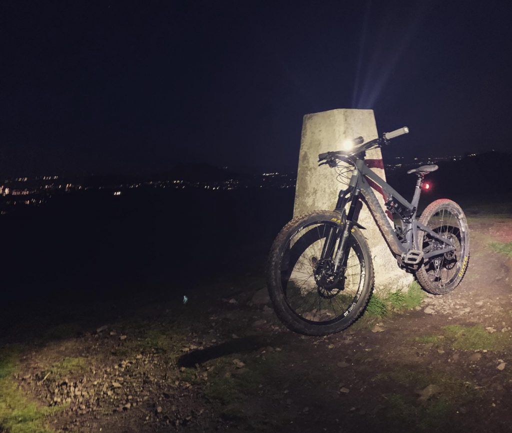 Santa Cruz MTB at the Trig Point on Braid Hills at night.